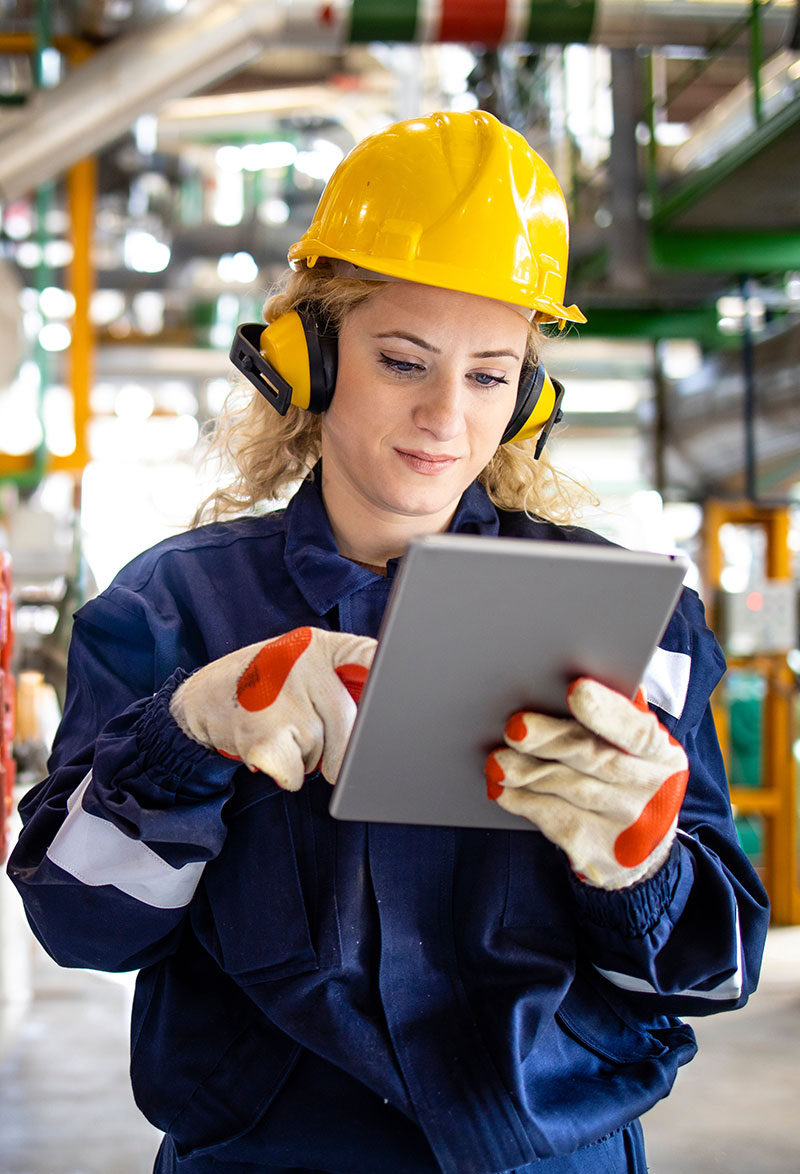 tier one safety training values worker reading tablet